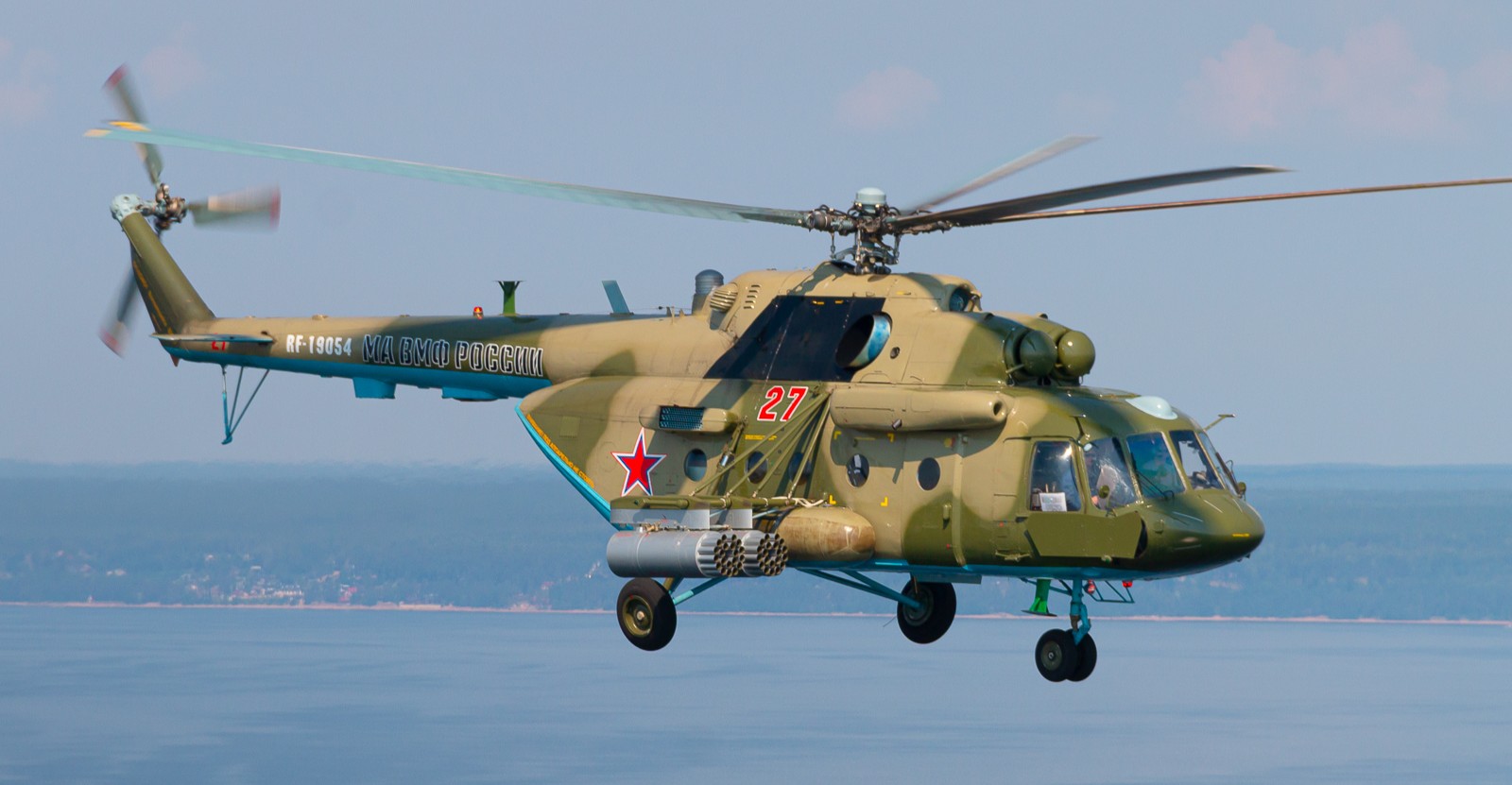Russian Mi-8 helicopter in flight over water